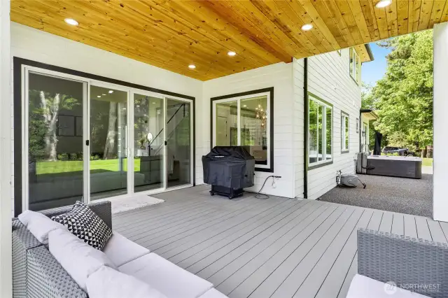 Step outside to the covered deck perfect for lounging or entertaining.