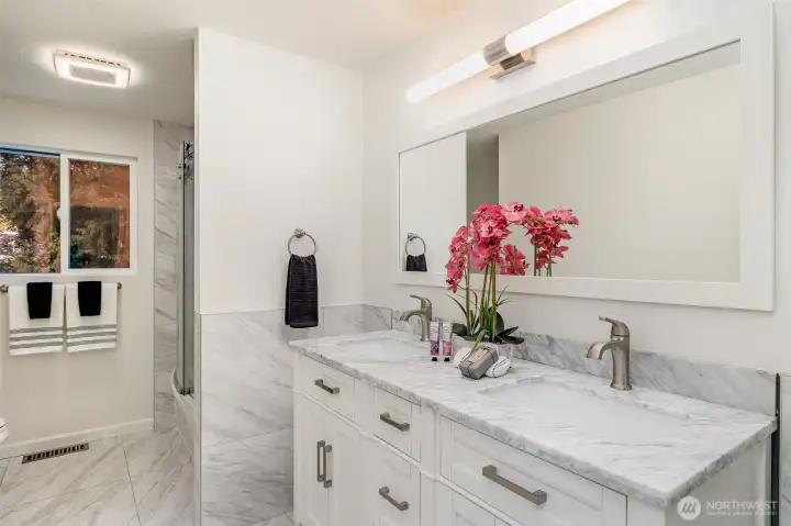 Modern, updated bathroom with a double sink vanity