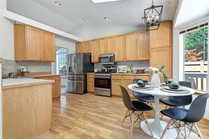 Lots of storage with pull-out drawers. Newer SS appliances. Eat-in nook overlooks the private back yard.