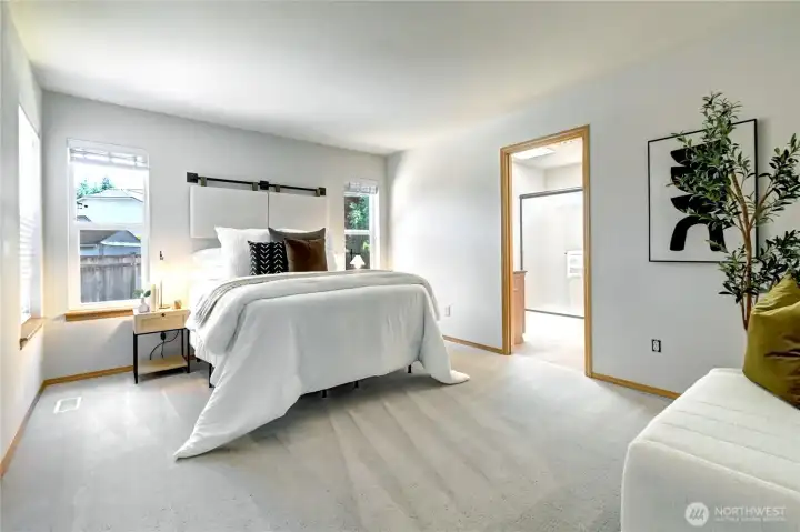 Large primary bedroom with ensuite and walk-in closet