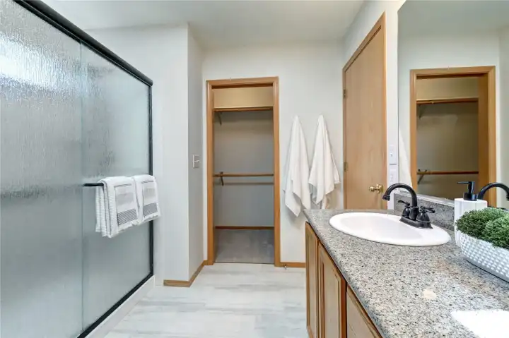 Primary bath and walk-in closet.