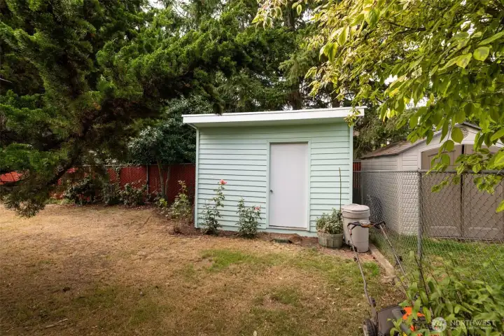 Large 10' x 12' storage shed with power — perfect for tools, hobbies, or a workshop.
