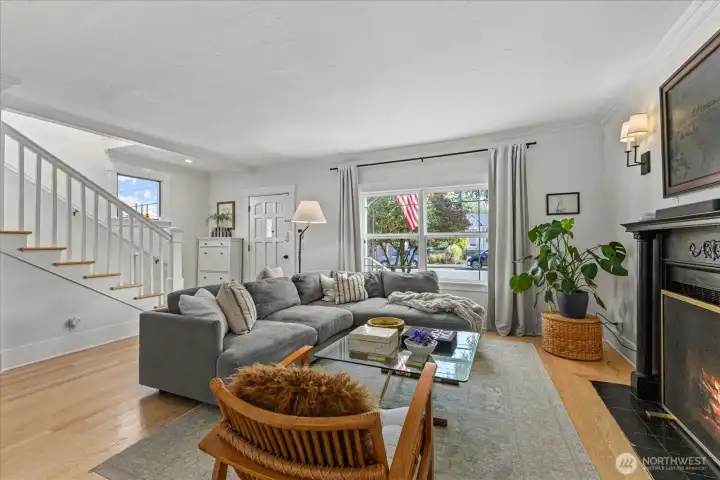 Stairs as you enter lead you to the upper-level bedrooms with skylights and private deck.