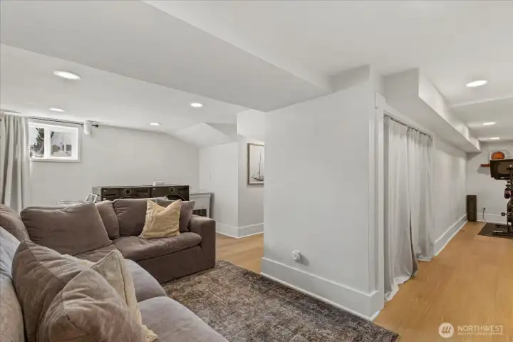 Finished basement offering additional living space, with flex area to the right