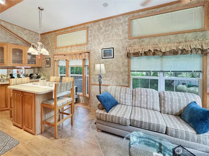 Open living space flowing to kitchen