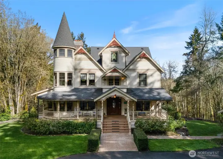 Stunning custom-built Victorian estate in Gig Harbor offers over 3.5 acres of privacy and seclusion. (2 parcels sold together)