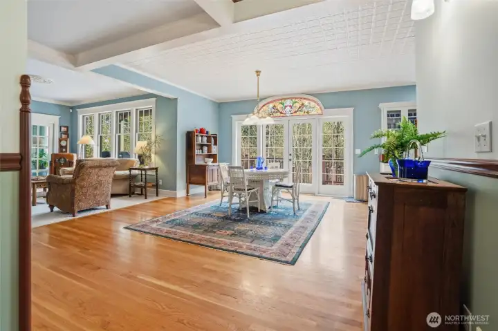 Gorgeous hardwood flooring, tin ceiling, stained glass accents....there is so much to love about this amazing home.
