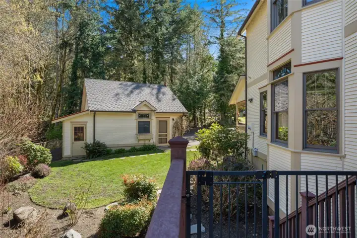 The detached garage includes a storage/potting shed great for yard tools.