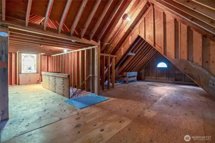 Don't miss the unfinished attic space, which is great for additional storage and has loads of potential.