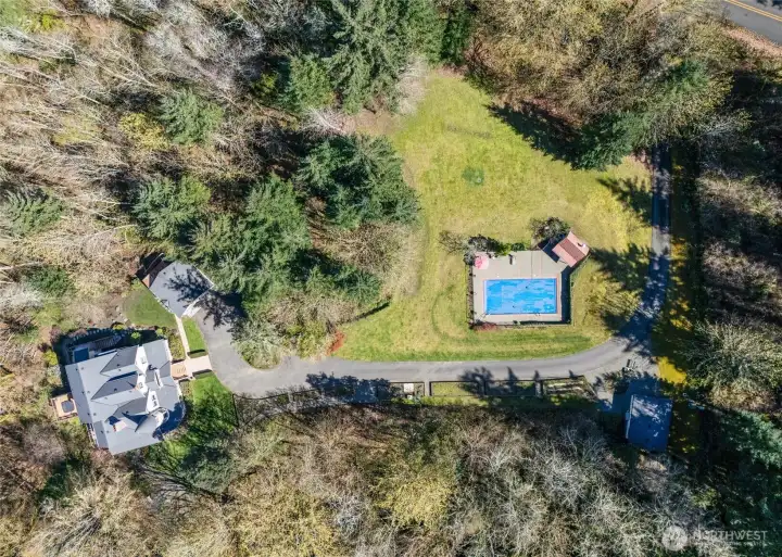 Aerial view of this amazing property, which is 3.61 acres and includes two parcels.  A private driveway into this amazing estate is secluded and enjoys a circular driveway.