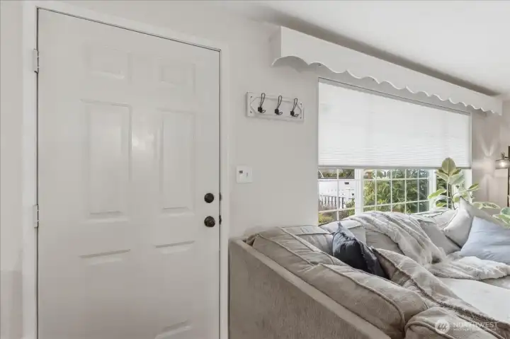 As you enter the home you are greeted by a light and bright living room.