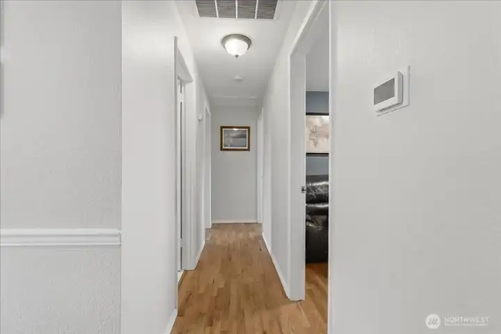 Hallway to bedrooms and bathroom.
