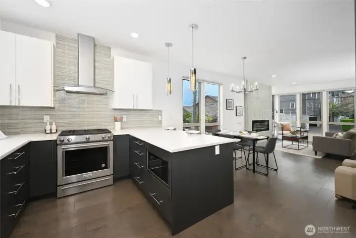 Kitchen has gas cooking and quartz counters.