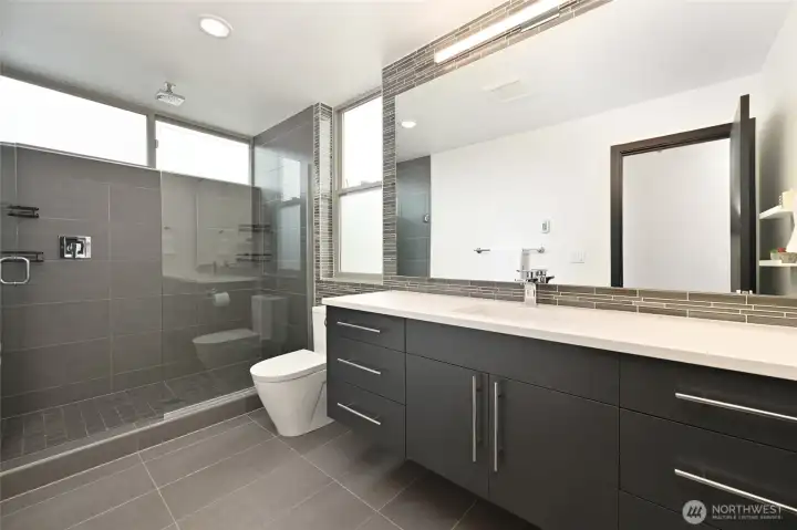 Large shower and spacious vanity.
