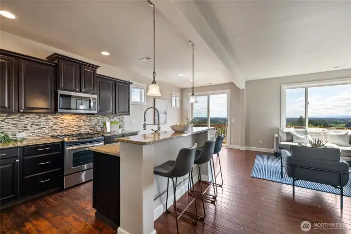 Open-concept design with beautiful views from the breakfast nook and eating bar area