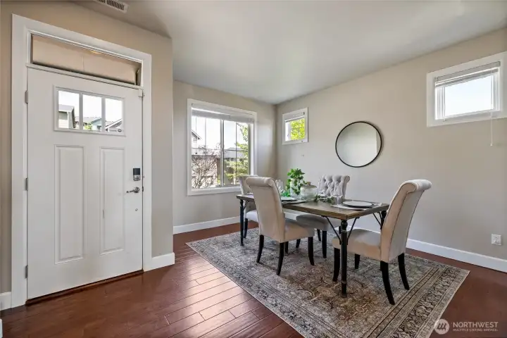 Formal dining room with abundant windows and natural light