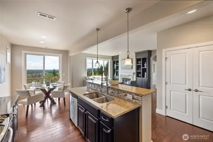 Kitchen featuring an eating bar and spacious pantry