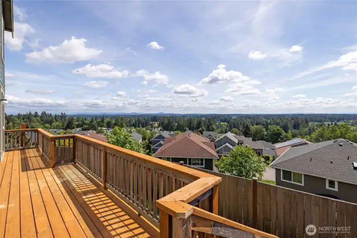 Newly restored deck with refreshed wood surfaces and fresh stain — perfect for outdoor enjoyment