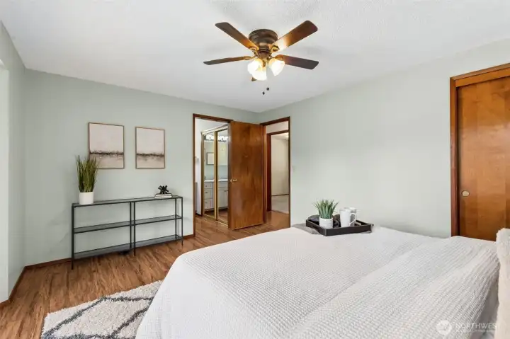 Primary bedroom with ceiling fan for added comfort year-round.