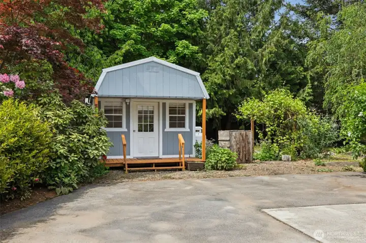 17x20 private retreat space with electricity, internet bridge installed, ceiling fan with light, and a 100-gallon propane tank for winter warmth.