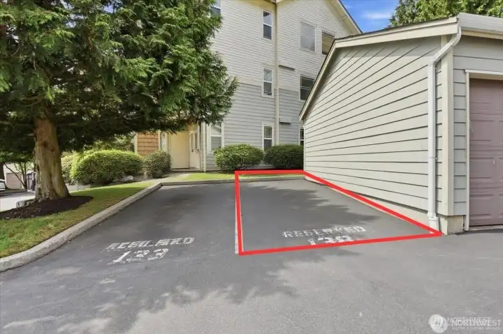 Assigned uncovered parking space #138