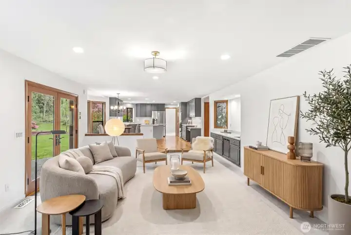 Family Room with French Doors Leading Out to the Serene Backyard