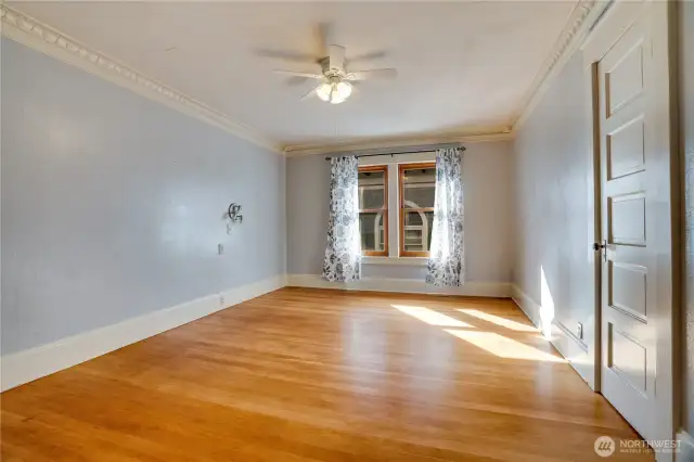 Four additional bedrooms, each with fir floors, extend along the 2nd floor hall with convenient access to the full bath.