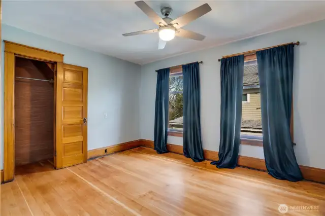 Notice the substantial baseboard trim, solid wood doors, and wood wrapped closets.