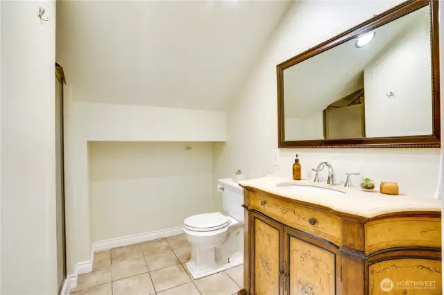 This 3rd bathroom includes a tiled shower heated by a water heater dedicated just to this level of the home.