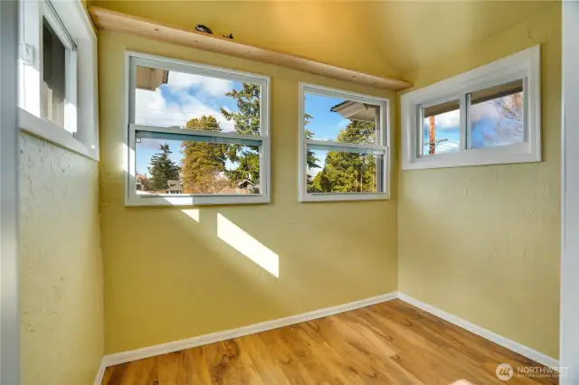 Set up a little reading nook, drawing table, or plant sanctuary in this room adjacent to the two 3rd floor bedrooms.