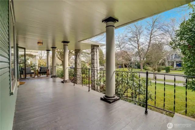 Bring patio furniture, wicker chairs, cushions and blankets out to the wraparound porch. Catch breezes moving through the big shade trees that help cool the neighborhood.
