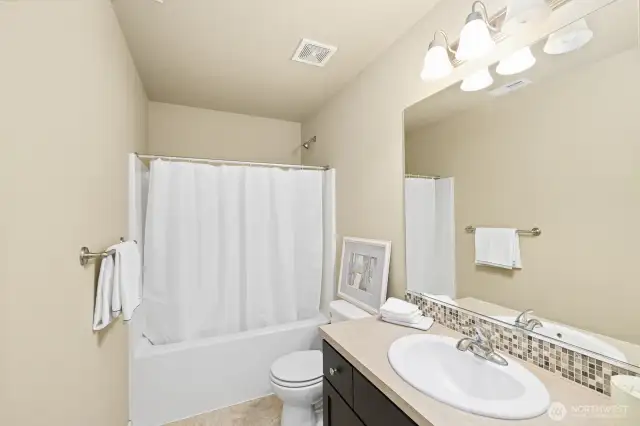 Guest full sized bathroom in the hallway upstairs.
