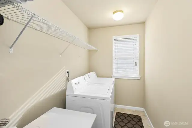 Convenient Utility room upstairs.