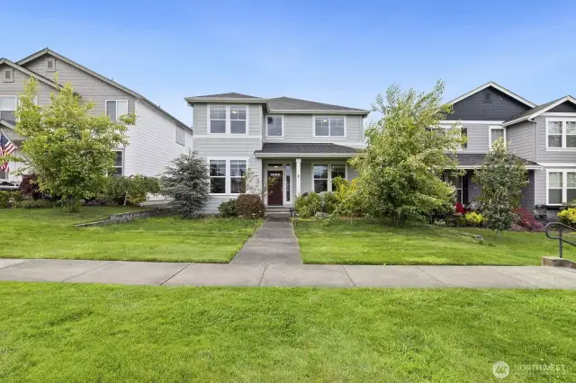 A walking path in front of house.