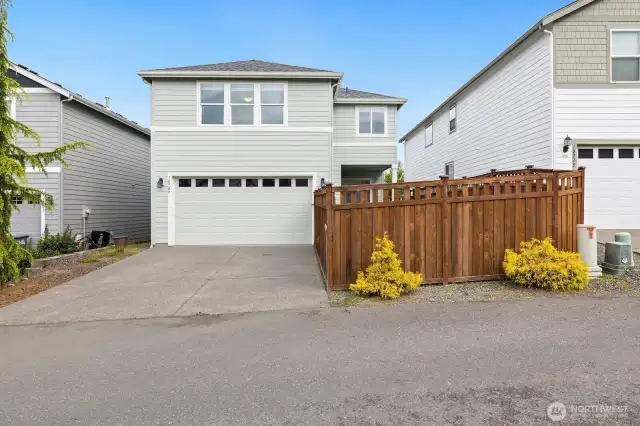 Walking to front door this way: to the left of the driveway looking in. Not the fence side.