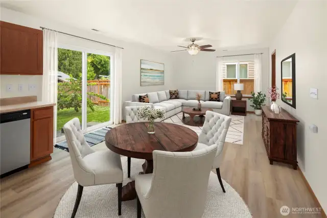Virtually staged dining and great room.  Ceiling fan and light is real.  A place to relax and unwind.