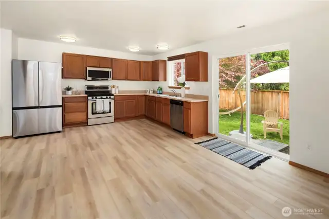Open kitchen, great room, and dining area