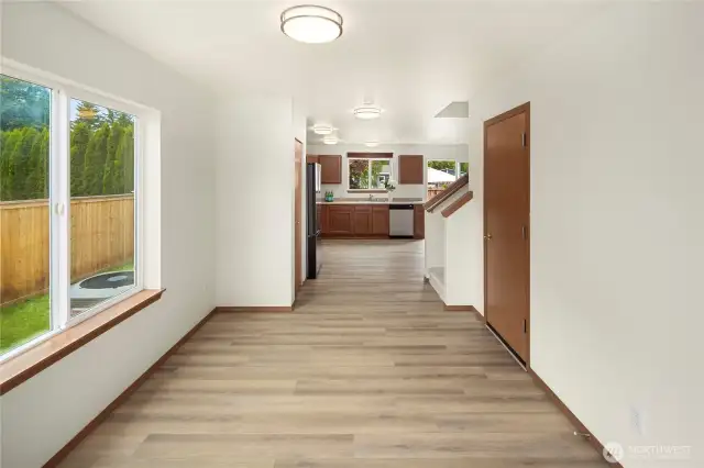 Welcomes your guests into this flexible space - living room, reading area or dining room.