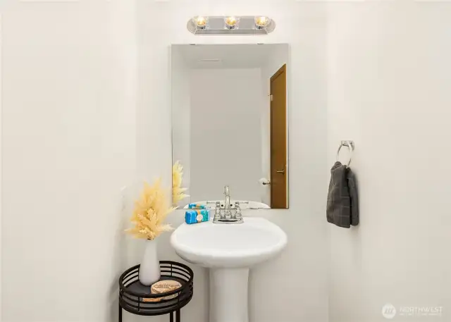 Powder room off great room.