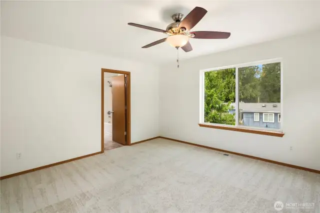 Primary Bedroom leading to the attached bathroom oasis