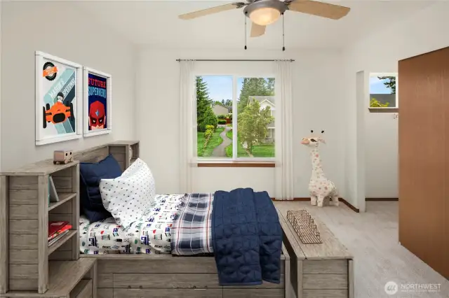 Bedroom #2 - Notice the window in the closet for natural light?   Ceiling fan for added comfort.  New paint and new carpeting and padding.