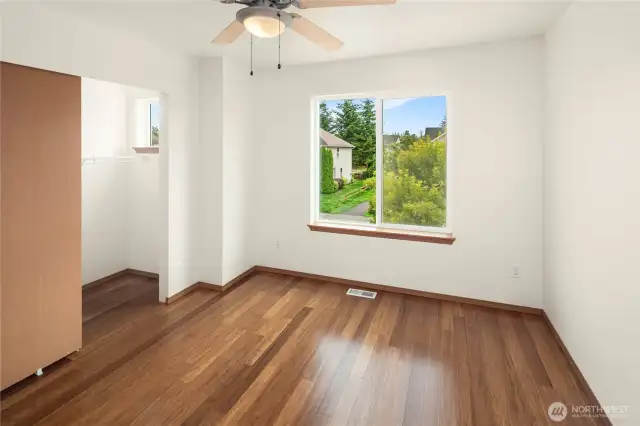 Bedroom #3 laminate flooring, great closet space that also comes with a window.