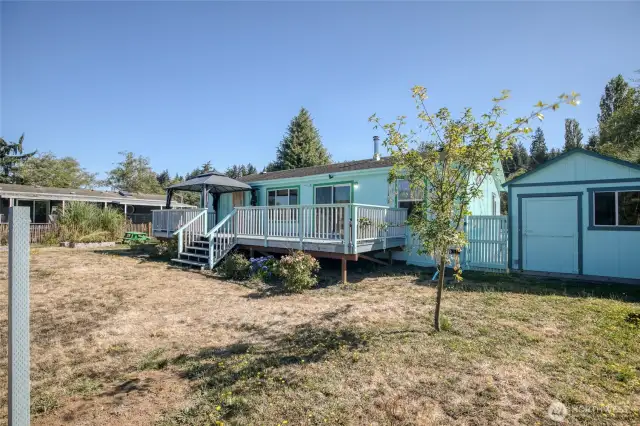 Large deck w/hot tub and pergola off of living room
