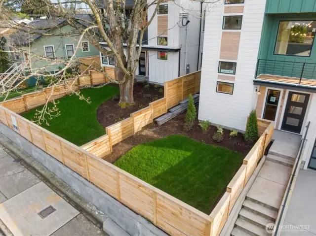 Enjoy a fully-fenced private front yard.