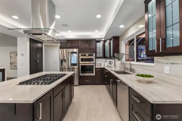 Generous storage runs from the ceiling to the floor, where radiant porcelain tile warms you underfoot.