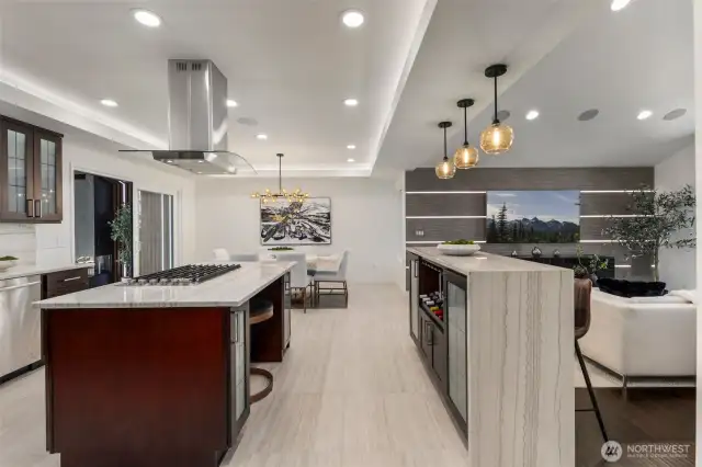 From prep to pour, this kitchen delivers with a beverage cooler in the island, wine storage at the waterfall bar, and space for everything in between.
