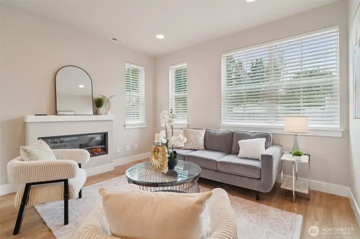 Spacious 9’ ceilings with energy efficient windows throughout providing an abundance  of natural light