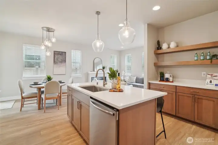 Wireless FREEPOWER charging station seamlessly hidden within the quartz bar  countertop