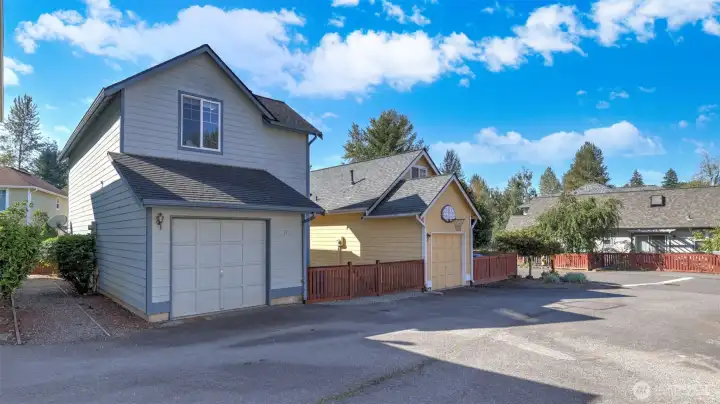 1 car garage plus one uncovered parking space.