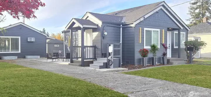 Virtually staged with refreshed green grass.